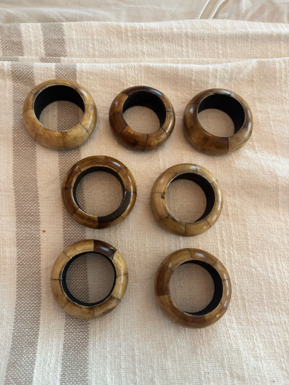 Set of 7 Wooden Napkin Rings - Mixed Brown Tones